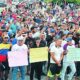 Migrantes se manifiestan en frontera sur de México para exigir libre tránsito